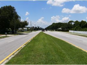 1354 Ne Port Palm Bay, FL 32905 - Photo 2 of 7 a view of a street