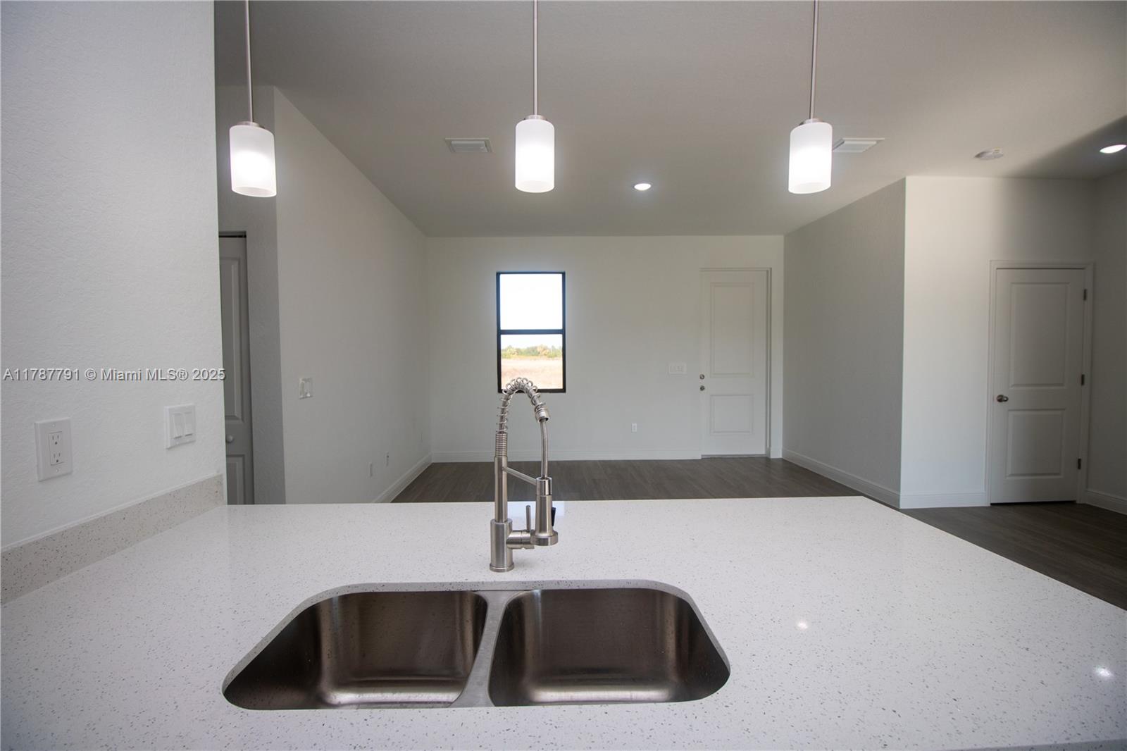 9023 Meadow Circle LaBelle, FL 33935 - Photo 17 of 35 a bathroom with a sink and a mirror