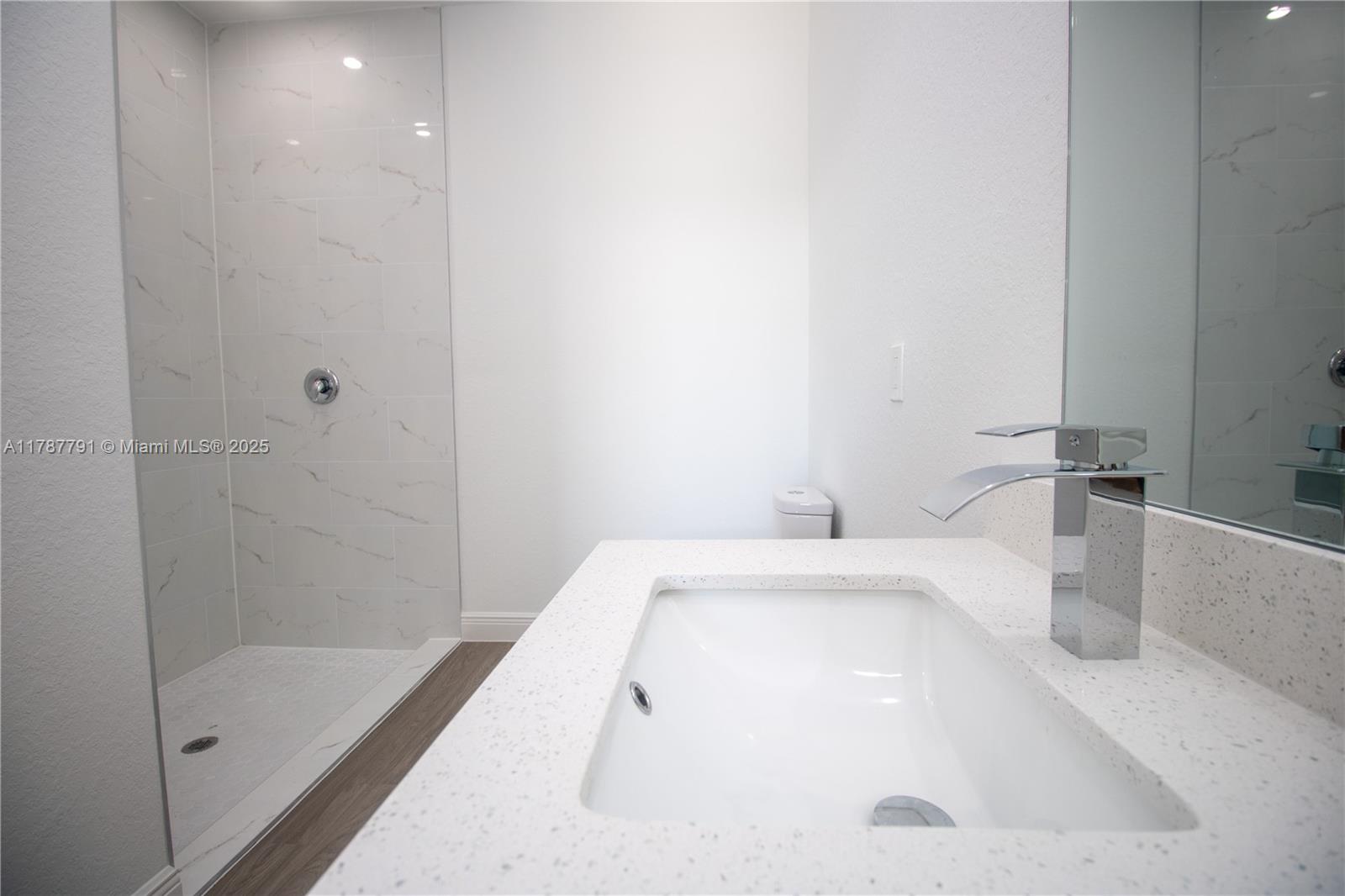 9023 Meadow Circle LaBelle, FL 33935 - Photo 27 of 35 a bathroom with a tub and shower