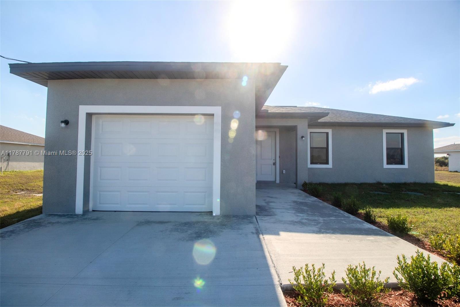 9023 Meadow Circle LaBelle, FL 33935 - Photo 34 of 35 a view of a big room with wooden floor and cabinet