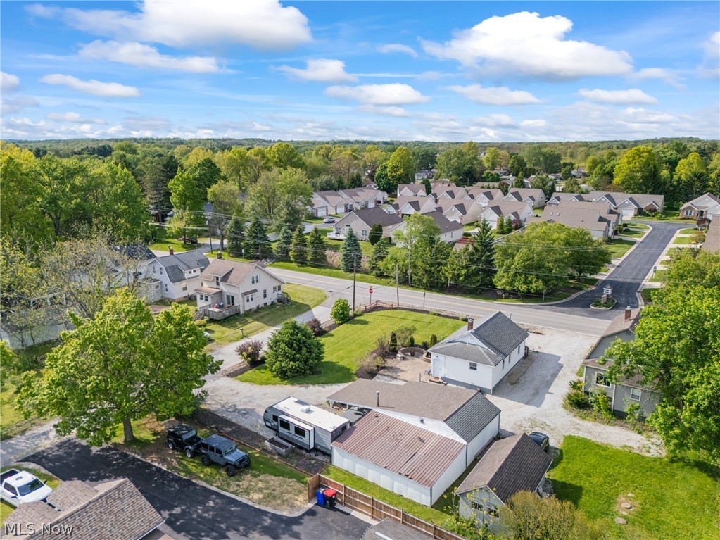 258 Randolph Road Mogadore, OH 44260 - Photo 44 of 49 Aerial perspective of a residential area featuring multiple single-family homes with varying architectural styles