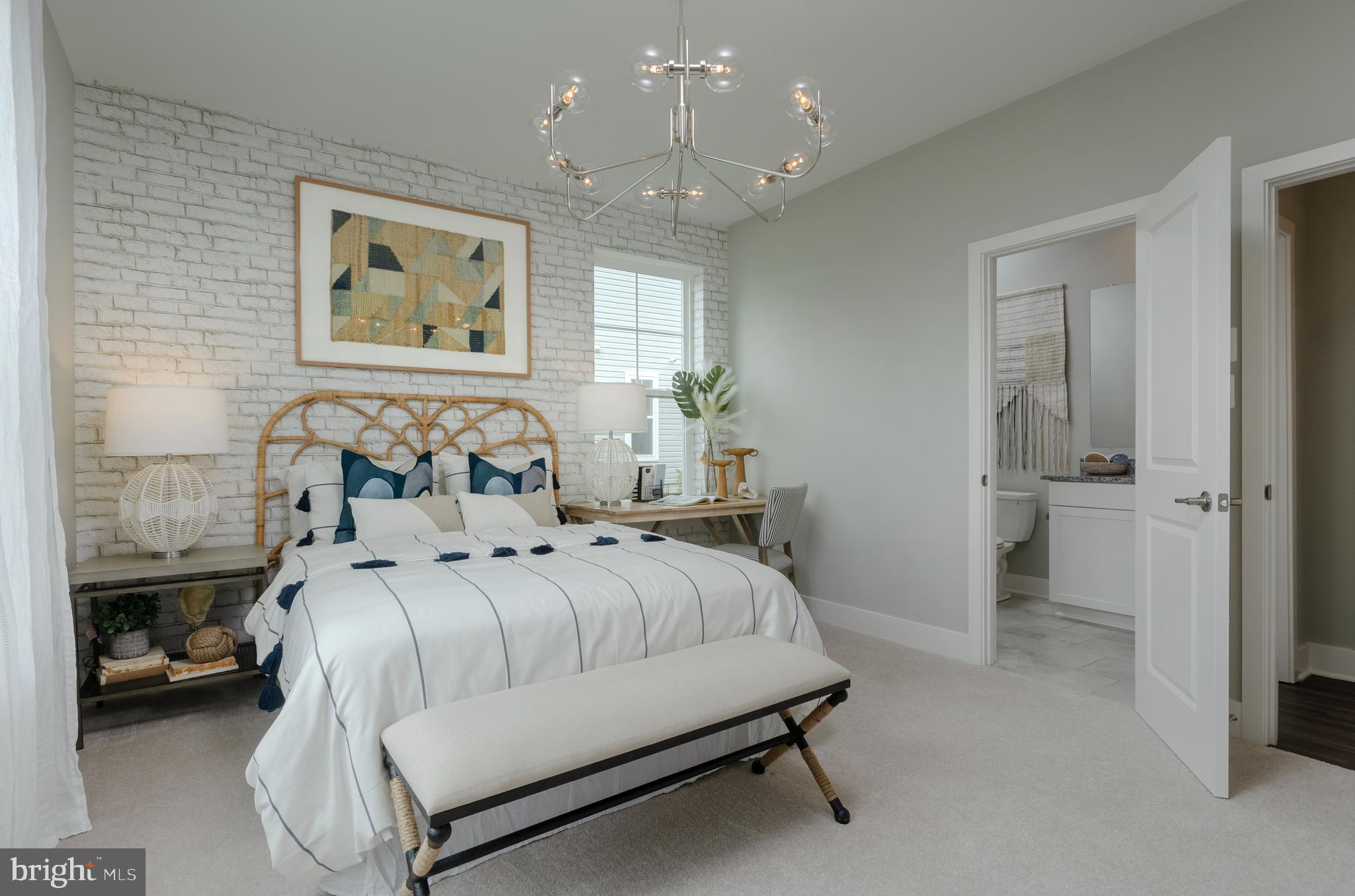 35135 Kindleton Lane Lewes, DE 19958 - Photo 11 of 16 a bedroom with a bed and a view of bathroom