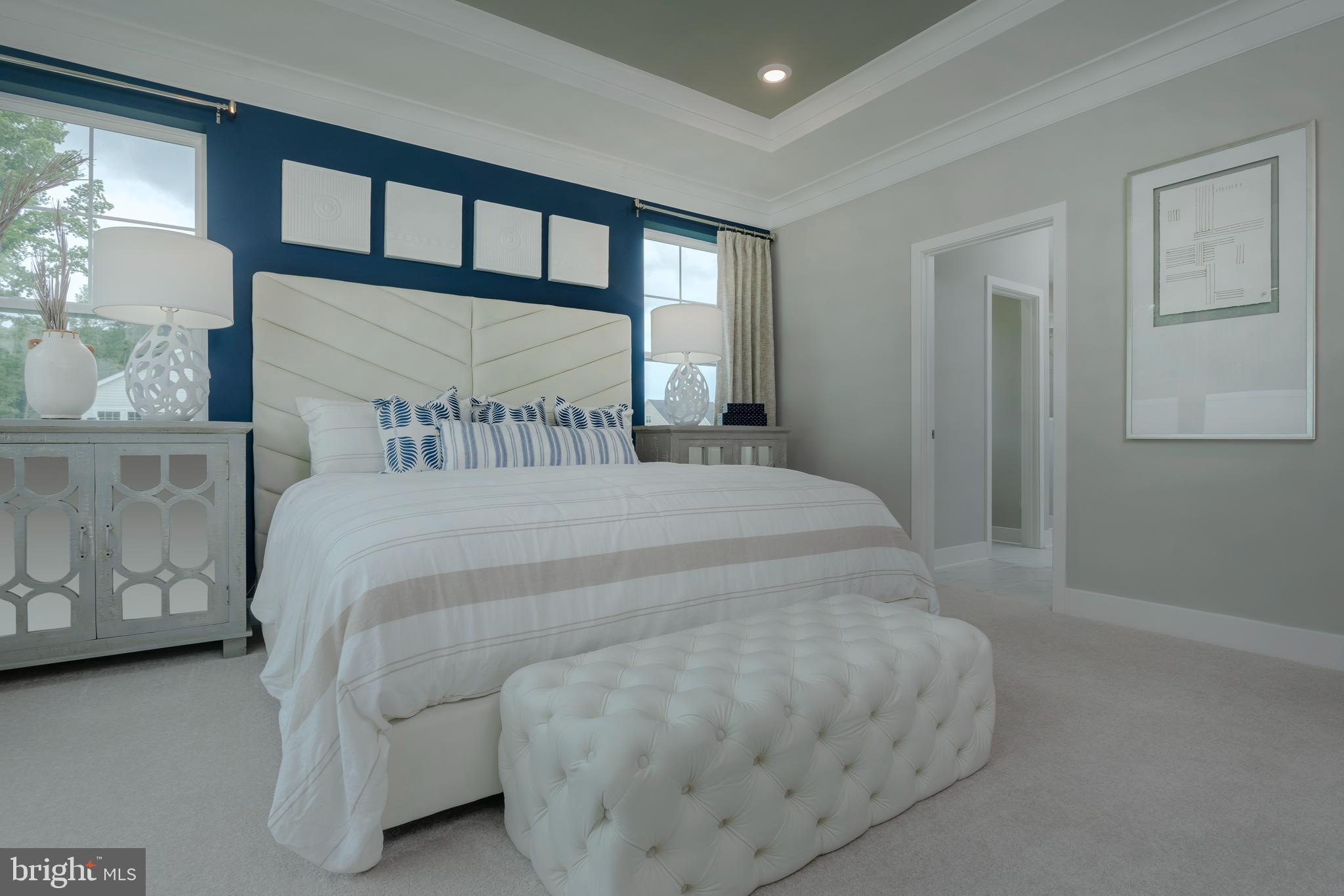 35135 Kindleton Lane Lewes, DE 19958 - Photo 13 of 16 a bedroom with a bed mirror and a window