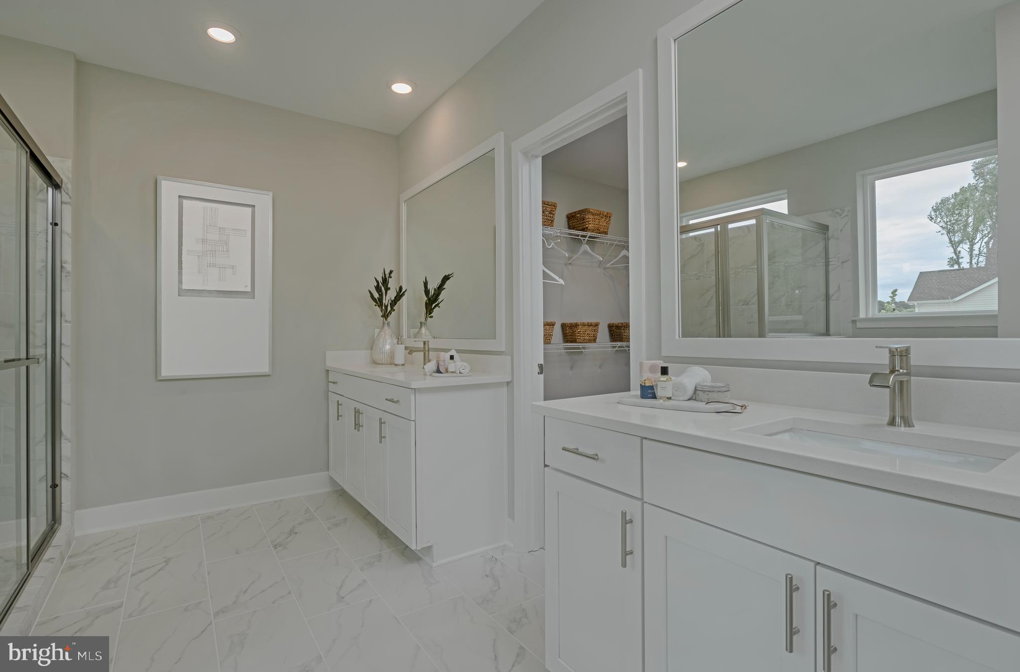 35135 Kindleton Lane Lewes, DE 19958 - Photo 15 of 16 a bathroom with a sink and a mirror