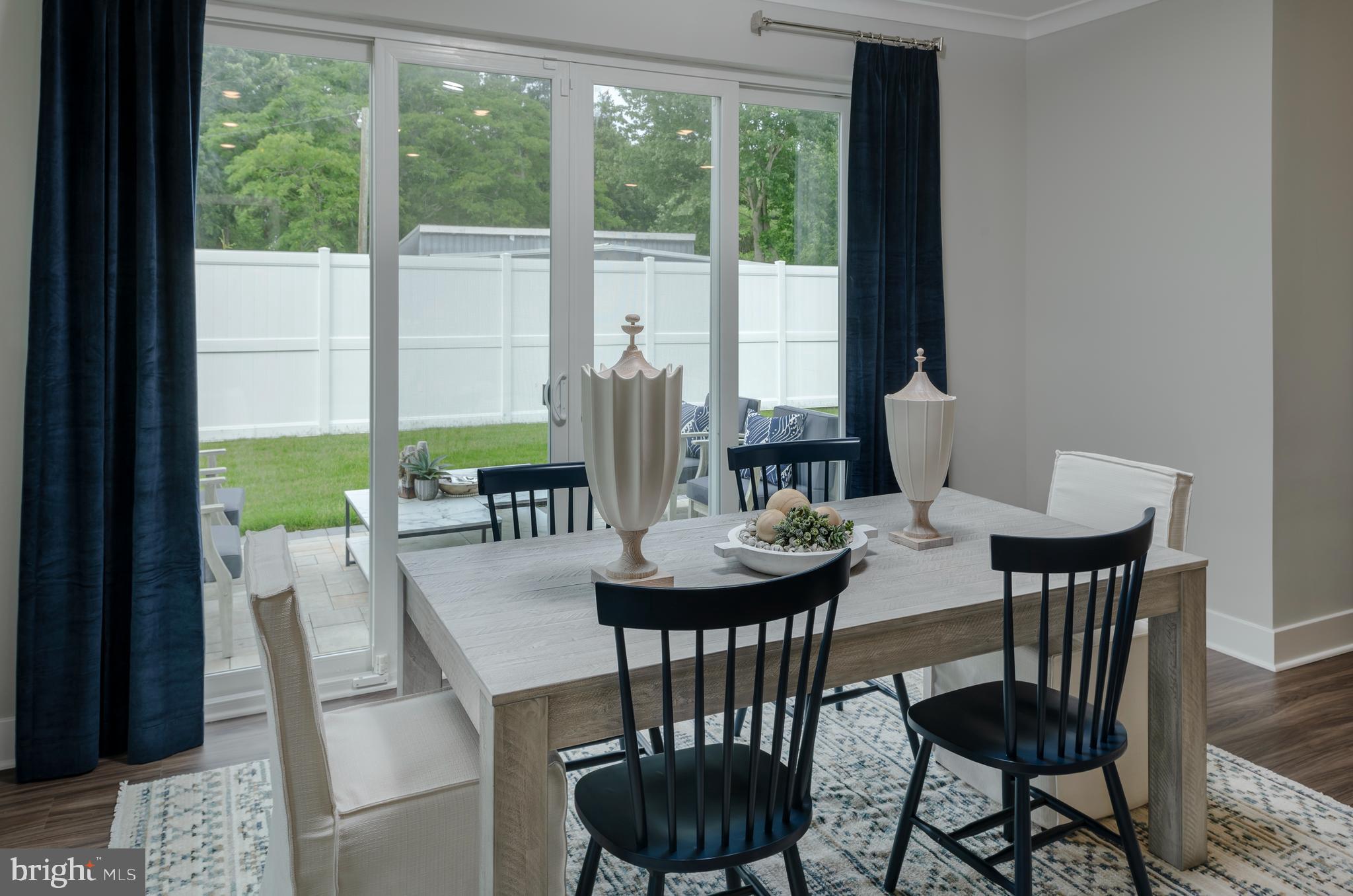 35135 Kindleton Lane Lewes, DE 19958 - Photo 4 of 16 a view of a dining room with furniture and window