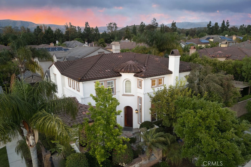 an aerial view of a house with a garden