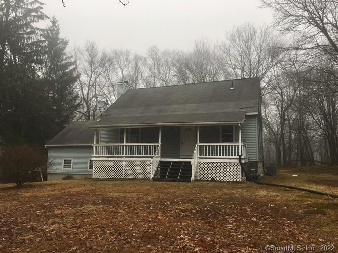 59 Straitsville Road Prospect, CT 06712 - Photo 1 of 1 front view of house with a yard
