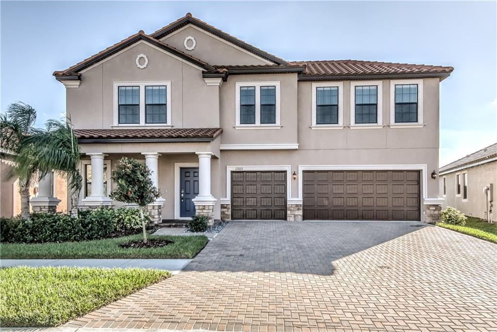 11923 Sand Myrtle Road Riverview, FL 33579 - Photo 1 of 1 Exterior with brick paver driveway, lead walk, and front porch