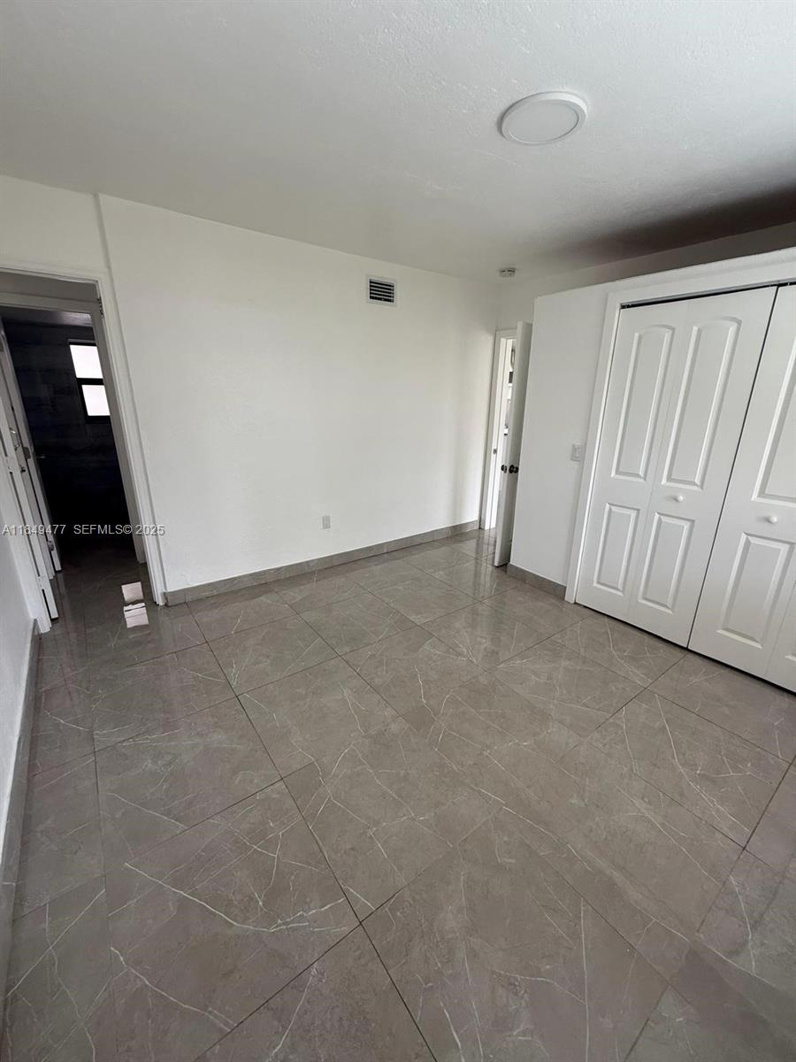 351 East 4th Avenue, Unit 4 Hialeah, FL 33010 - Photo 16 of 19 a view of an empty room