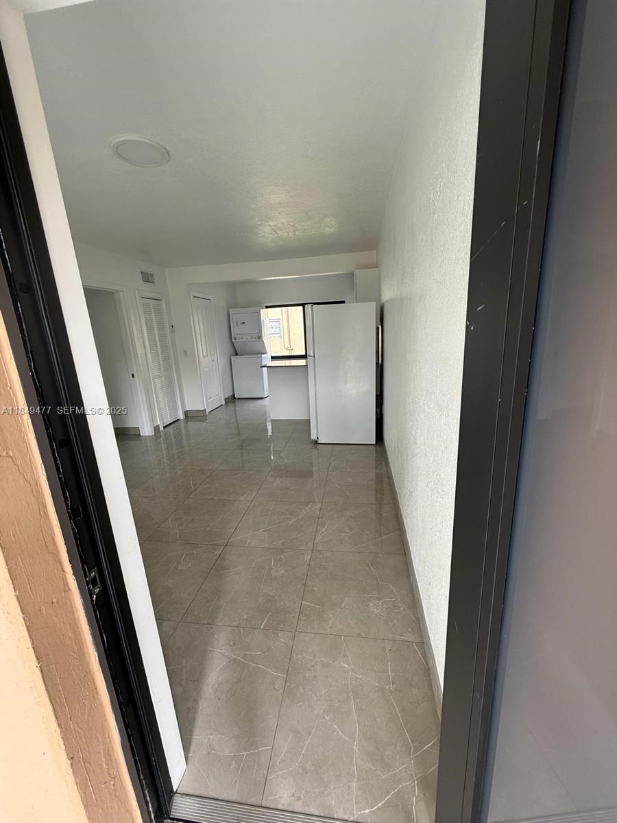 351 East 4th Avenue, Unit 4 Hialeah, FL 33010 - Photo 10 of 19 a view of a hallway