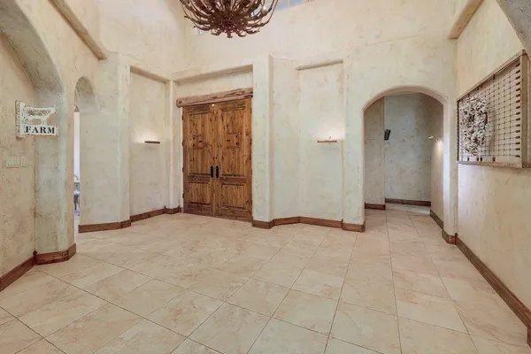 a view of empty room with windows