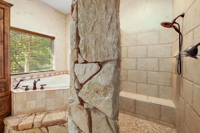 a view of house with a trees in front of it