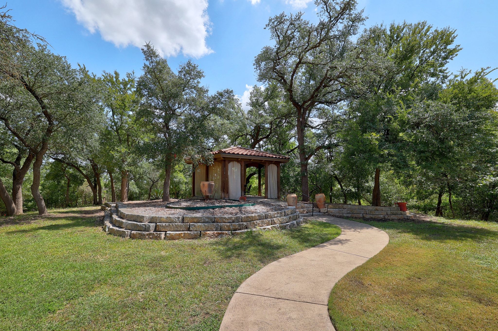 1120 Redbird Road Granger, TX 76530 - Photo 28 of 40 a view of a house with backyard and trees