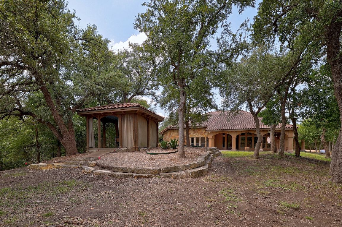 1120 Redbird Road Granger, TX 76530 - Photo 30 of 40 a view of house with a trees in front of it