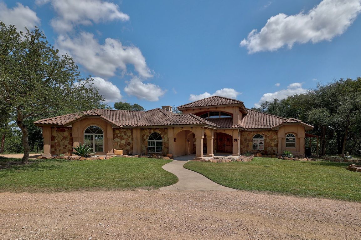 1120 Redbird Road Granger, TX 76530 - Photo 6 of 40 a front view of a house with garden