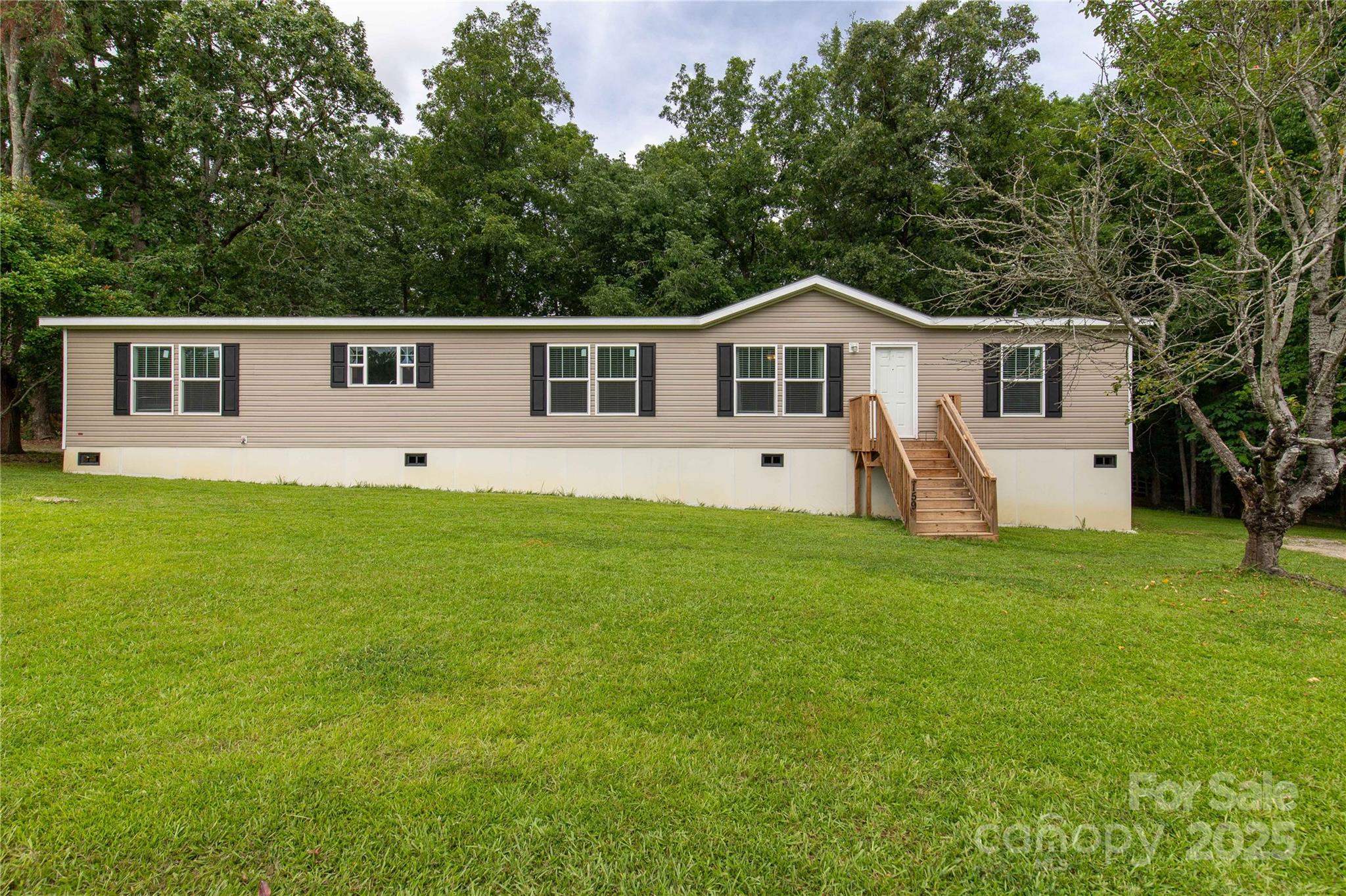 159 Blackmon Road Lancaster, SC 29720 - Photo 1 of 32 a front view of house with yard and green space