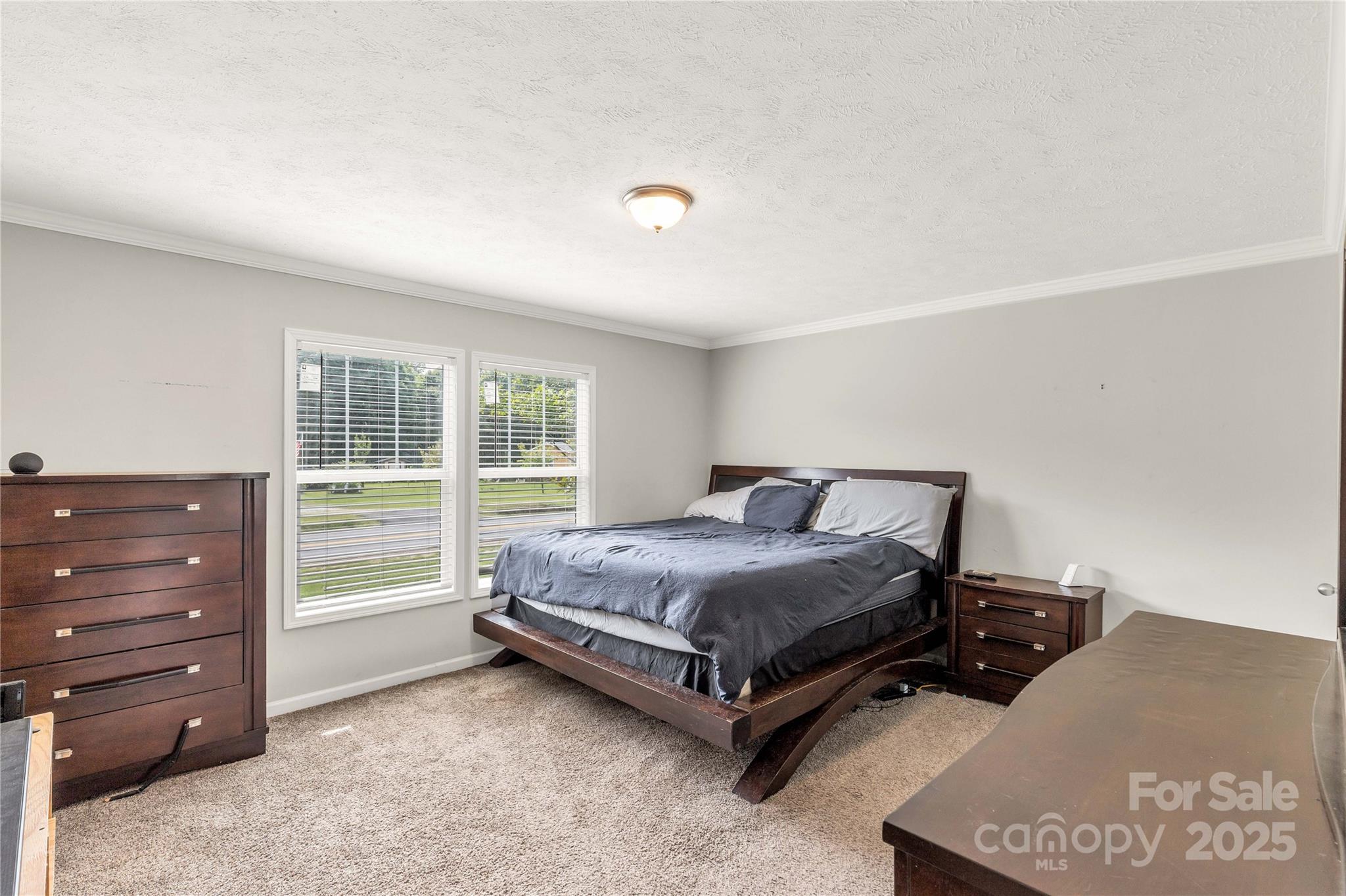 159 Blackmon Road Lancaster, SC 29720 - Photo 14 of 32 a bed room with a bed and a window
