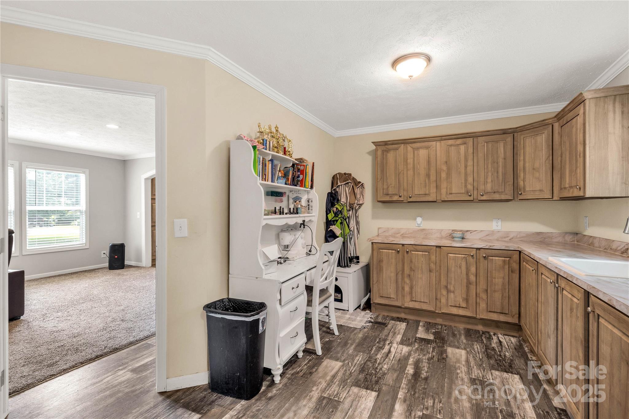 159 Blackmon Road Lancaster, SC 29720 - Photo 18 of 32 a view of a kitchen with fridge and workspace