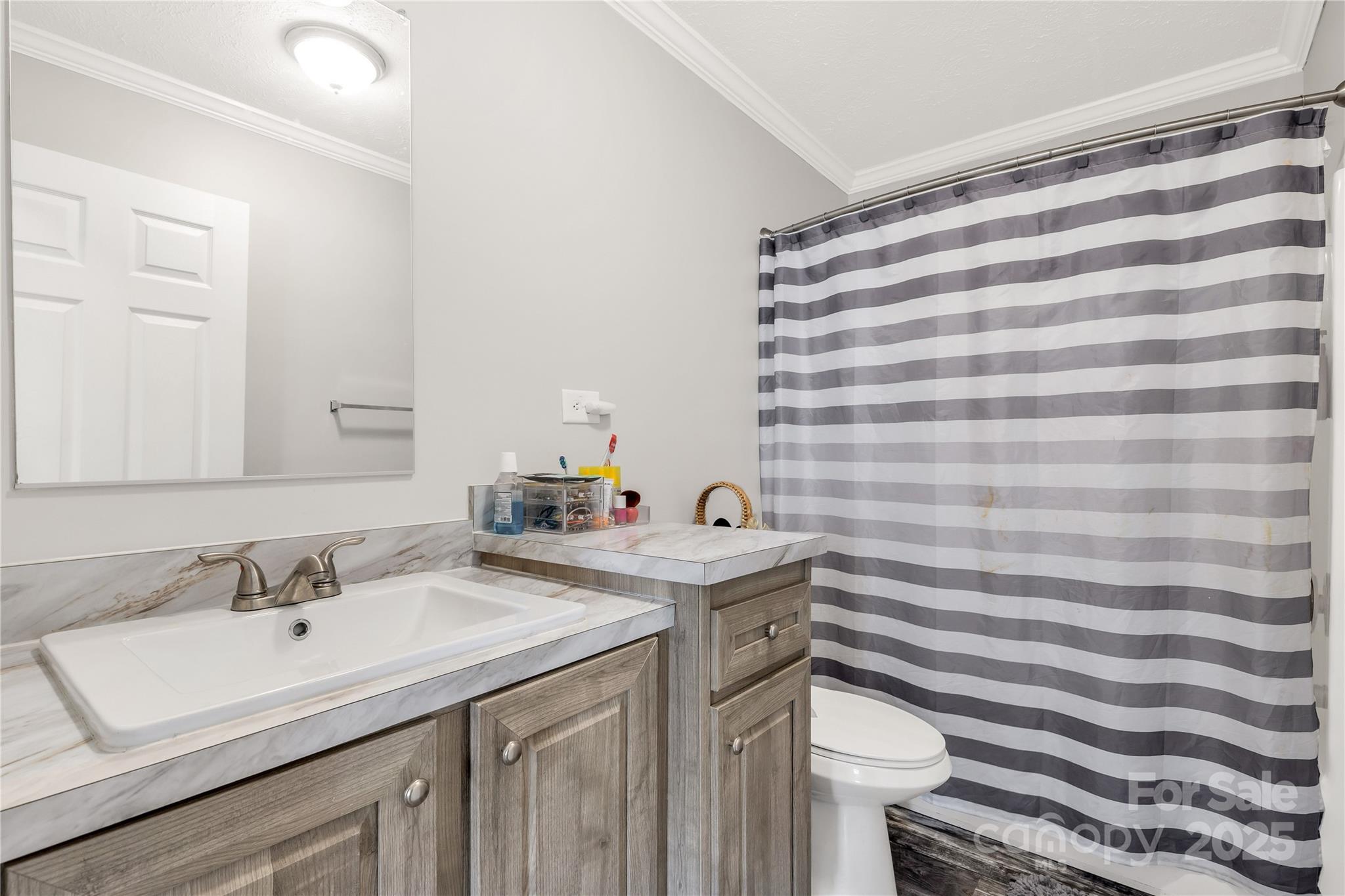 159 Blackmon Road Lancaster, SC 29720 - Photo 20 of 32 a bathroom with a sink toilet and shower