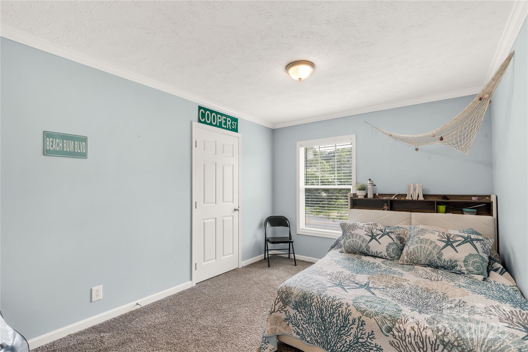 159 Blackmon Road Lancaster, SC 29720 - Photo 23 of 32 a bedroom with a bed and window