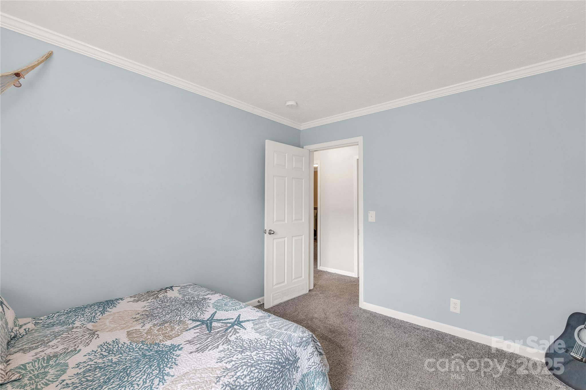 159 Blackmon Road Lancaster, SC 29720 - Photo 24 of 32 a bedroom with a bed and a window