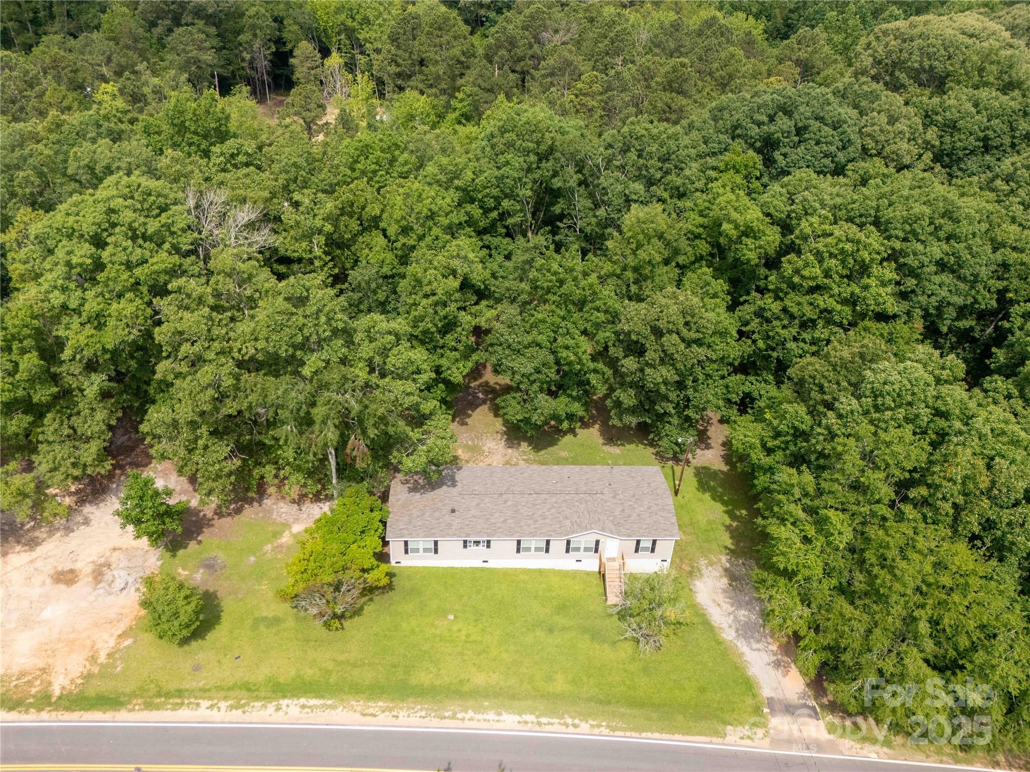 159 Blackmon Road Lancaster, SC 29720 - Photo 30 of 32 an aerial view of a residential houses with yard