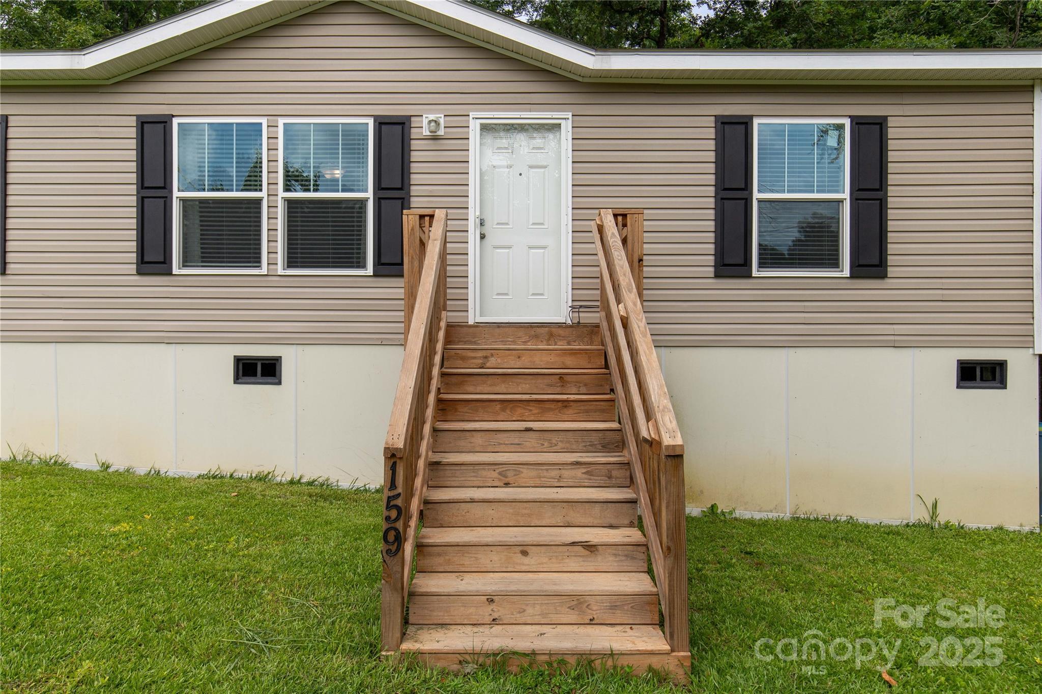 159 Blackmon Road Lancaster, SC 29720 - Photo 3 of 32 a view of a house with backyard