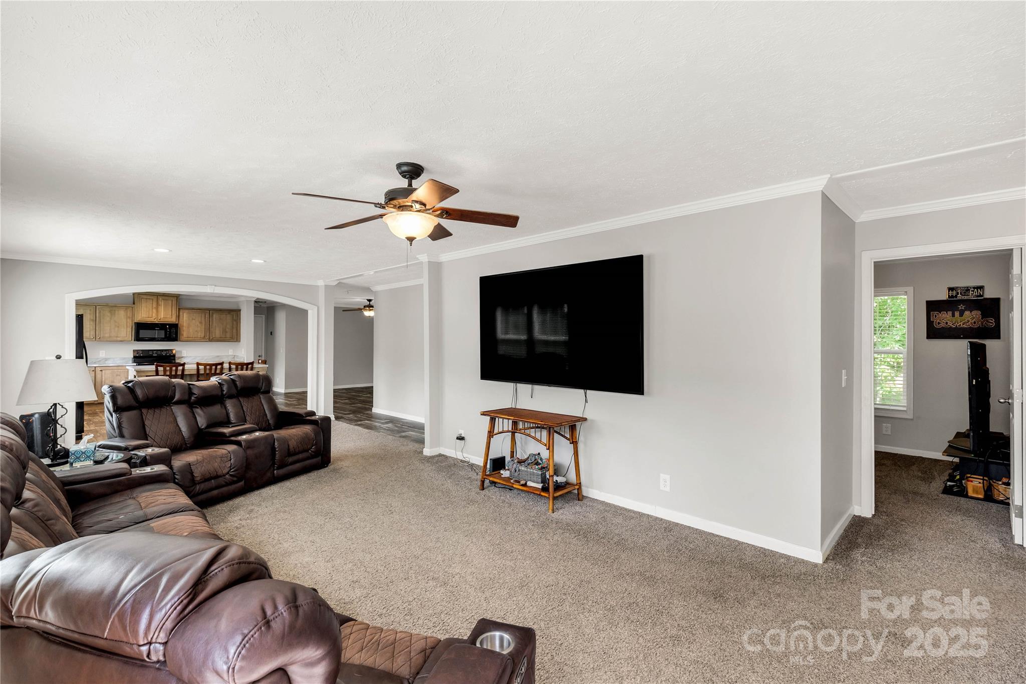 159 Blackmon Road Lancaster, SC 29720 - Photo 4 of 32 a living room with furniture and a flat screen tv