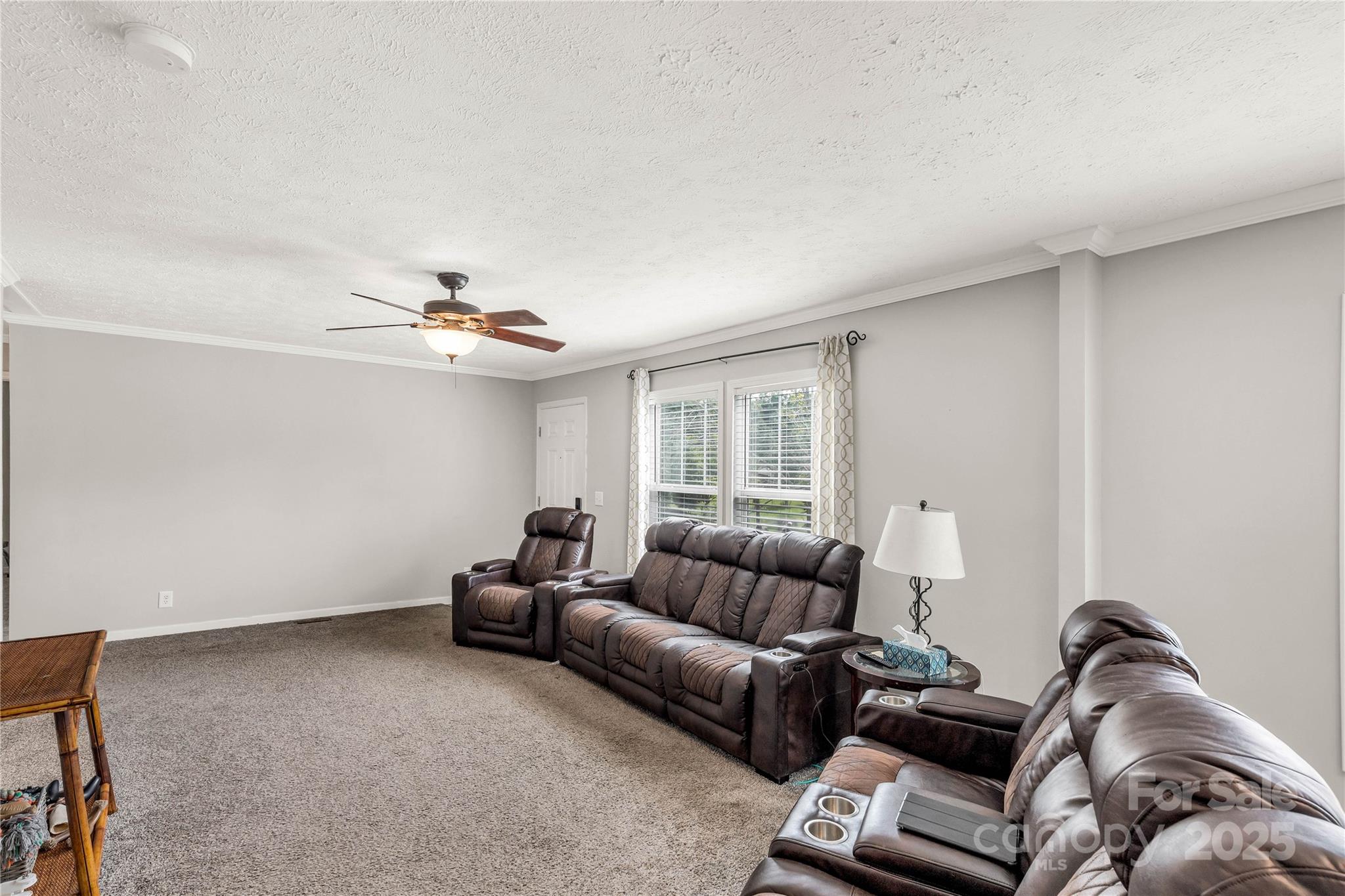 159 Blackmon Road Lancaster, SC 29720 - Photo 6 of 32 a living room with furniture and a ceiling fan