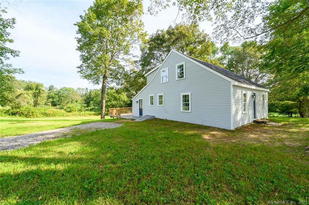 222 Hartford Road Brooklyn, CT 06234 - Photo 1 of 1 a view of a house with backyard