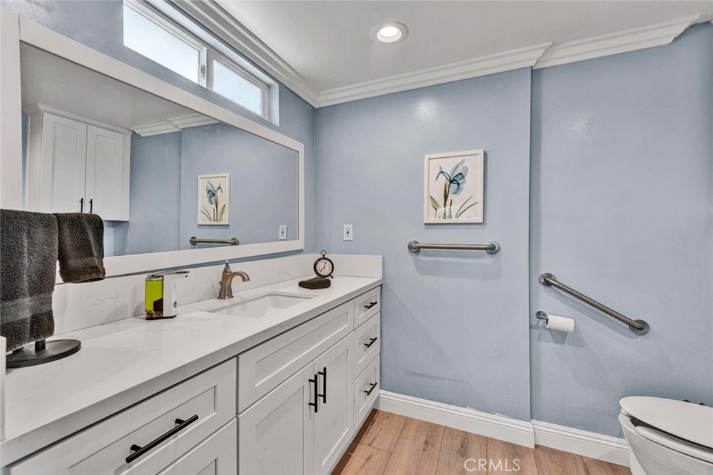 5456 Cadbury Road Whittier, CA 90601 - Photo 28 of 67 a bathroom with a sink double vanity and a shower