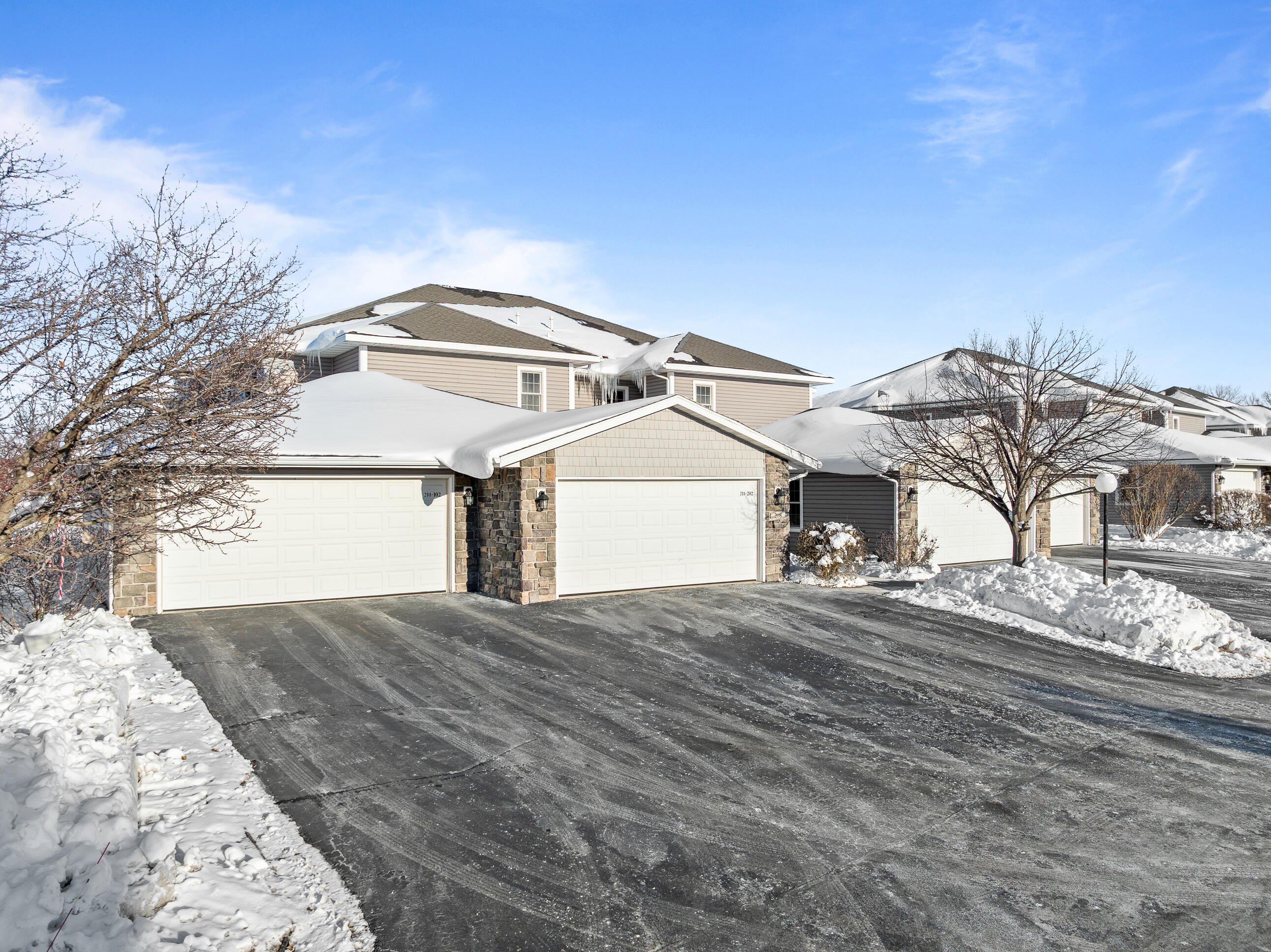 208 Potter Road, Unit 202 Elkhorn, WI 53121 - Photo 2 of 43 208 Potters Rd - Winter Exterior-1