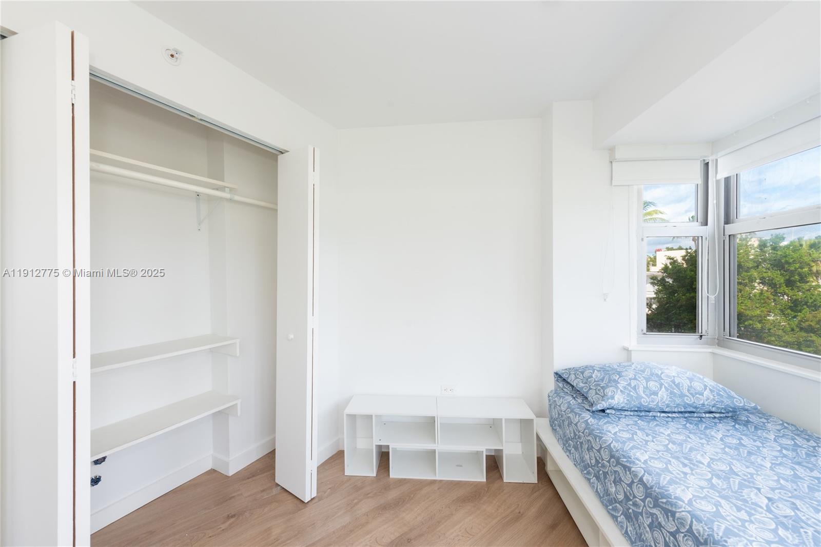 1881 Washington Avenue, Unit 3D Miami Beach, FL 33139 - Photo 20 of 30 a living room with furniture and a window