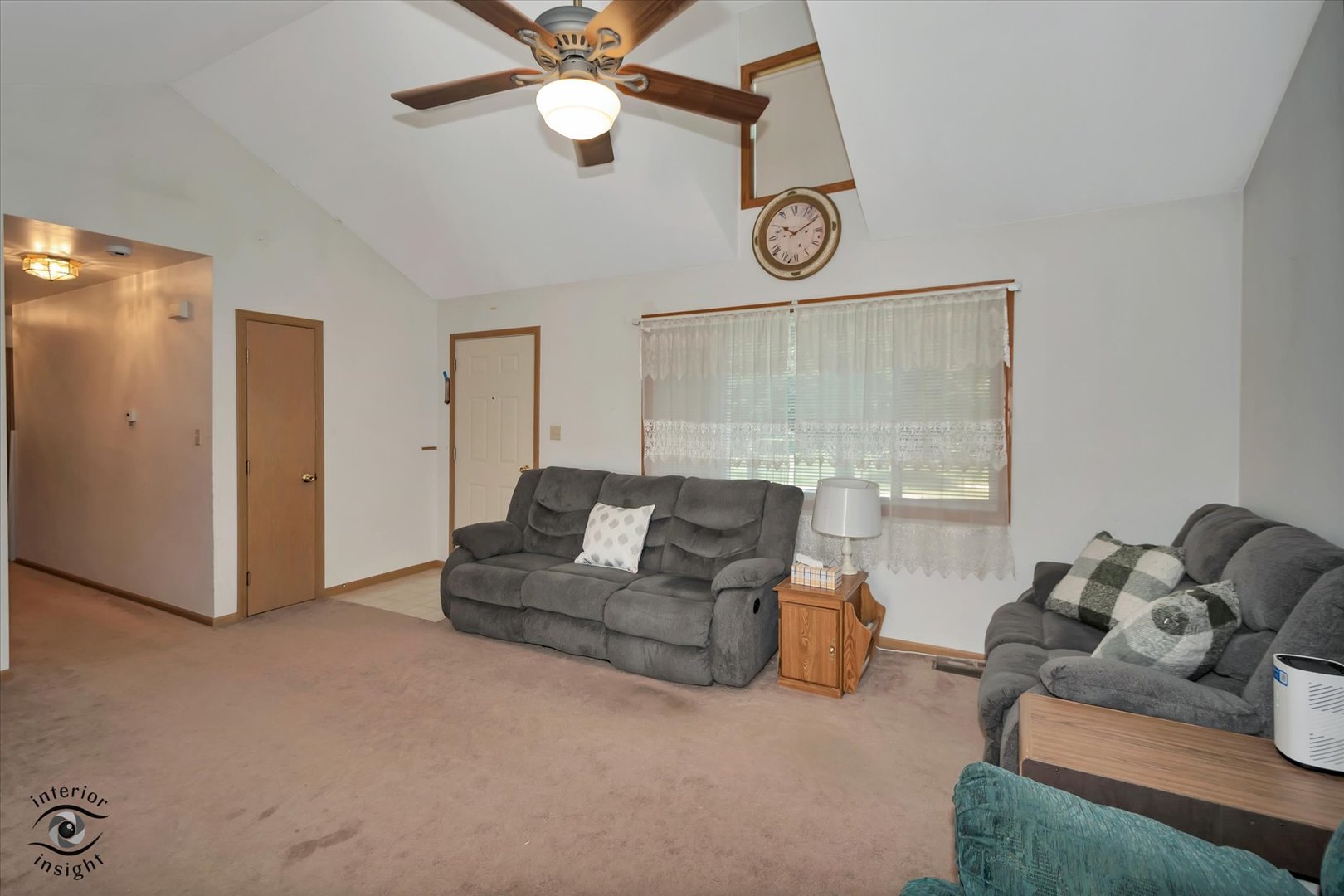 930 Meadowbrook Road Elwood, IL 60421 - Photo 4 of 25 a living room with furniture and a large window