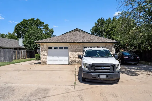 a car parked in front of a house