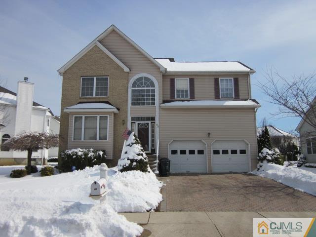 45 Potomac Road Monmouth Junction, NJ 08852 - Photo 1 of 1 a view of a house with snow in front of it