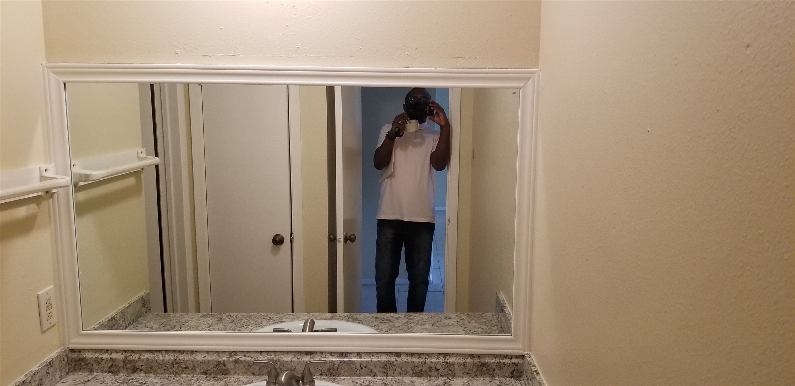 2017 West Sidnor Street, Unit 4 Alvin, TX 77511 - Photo 8 of 13 a view of a mirror