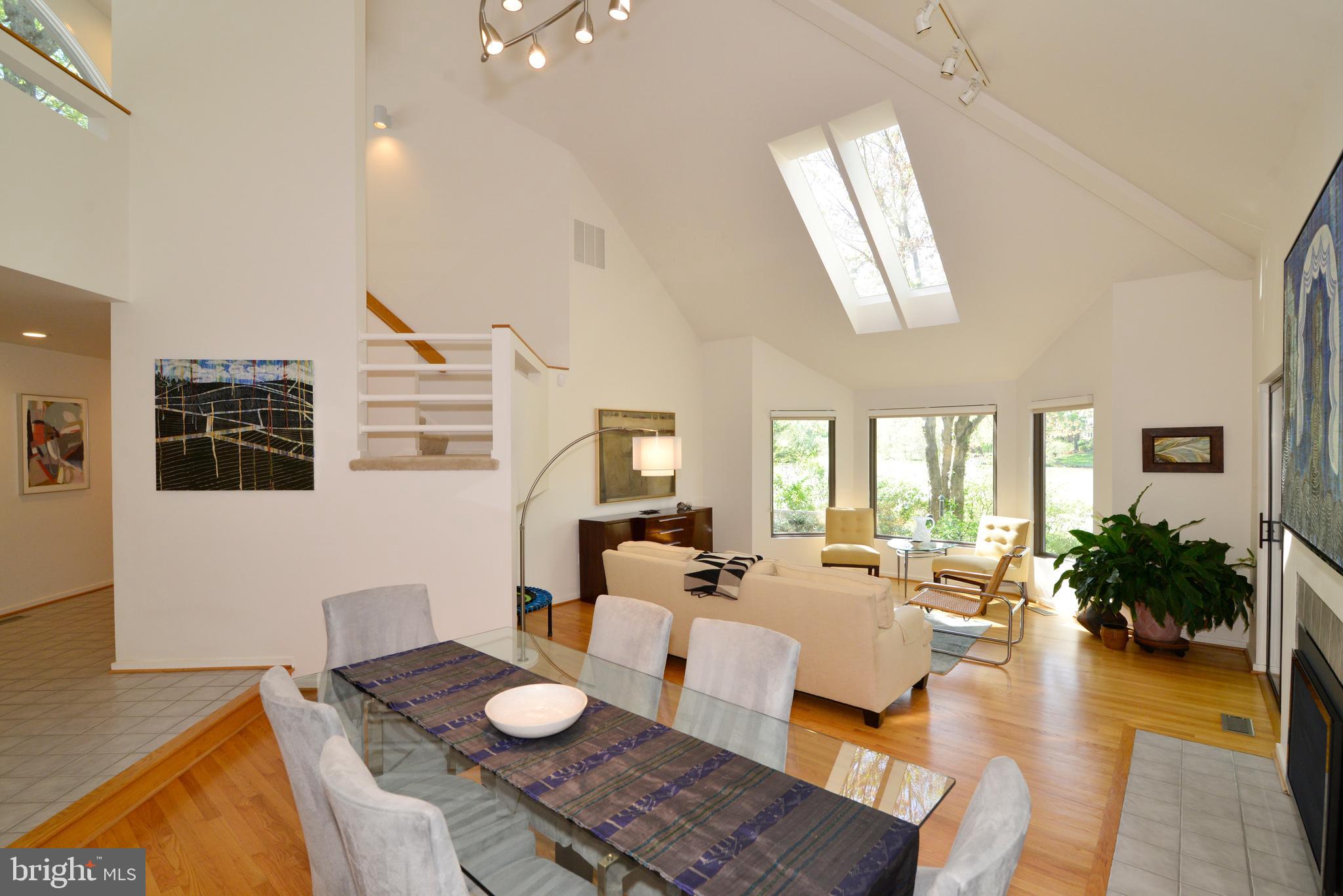 2262 Compass Point Lane Reston, VA 20191 - Photo 15 of 48 a living room with furniture and a wooden floor