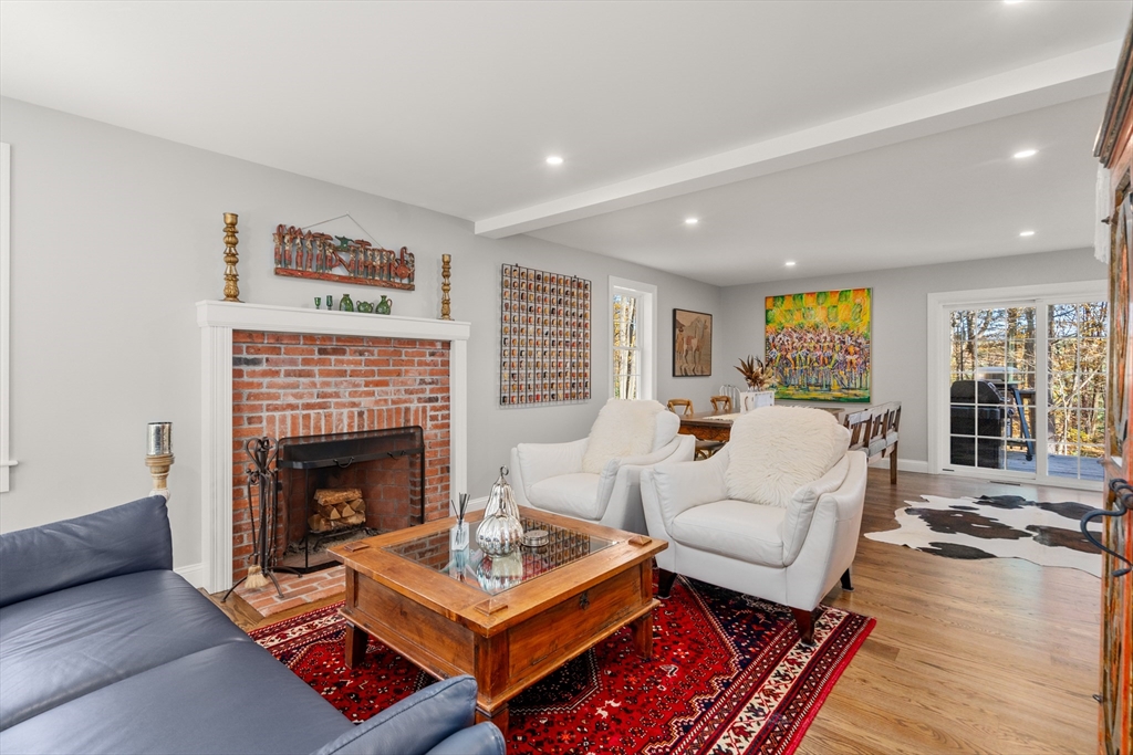 28 Allen Road Sturbridge, MA 01566 - Photo 11 of 33 a living room with furniture and a fireplace