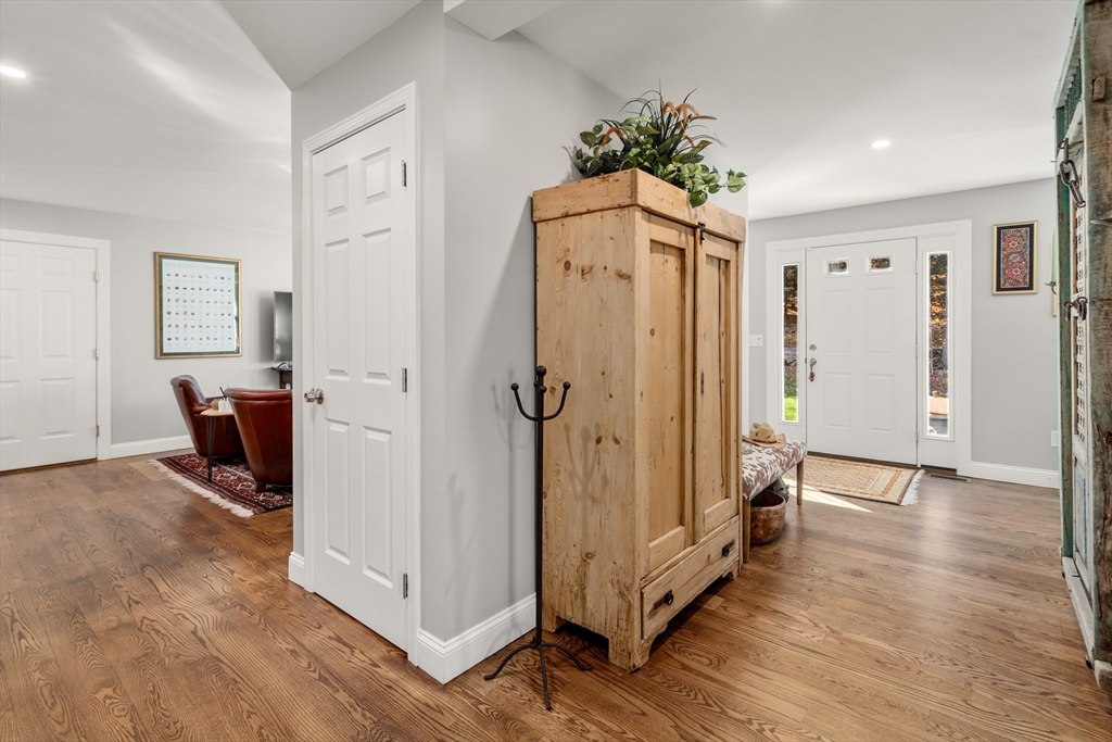 28 Allen Road Sturbridge, MA 01566 - Photo 14 of 33 a view of a hallway with entryway and wooden floor