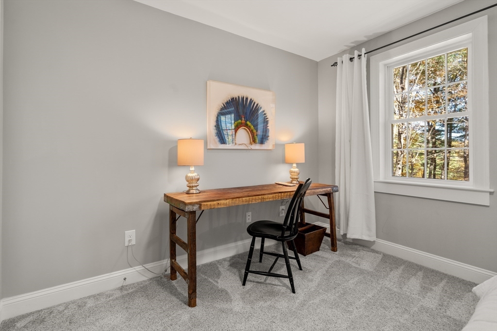 28 Allen Road Sturbridge, MA 01566 - Photo 23 of 33 a view of a workspace with furniture and a window