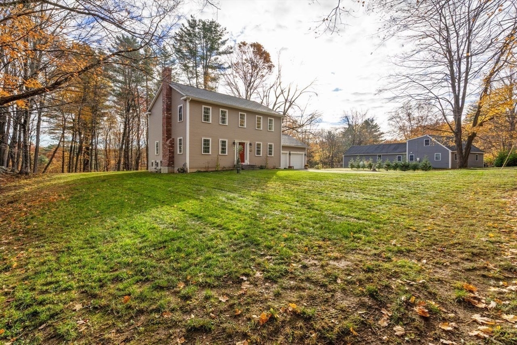 28 Allen Road Sturbridge, MA 01566 - Photo 32 of 33 a view of a house with a yard