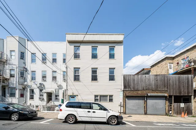 a car parked in front of a building