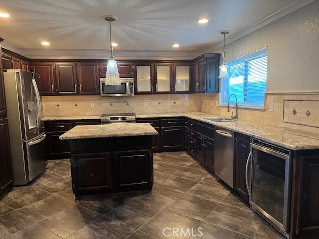 539 South Cinnamon Way Orange, CA 92866 - Photo 7 of 18 a kitchen with a sink and a refrigerator