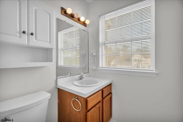 a bathroom with a sink and a toilet
