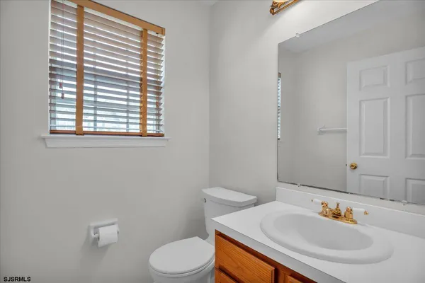 a bathroom with a sink and a toilet