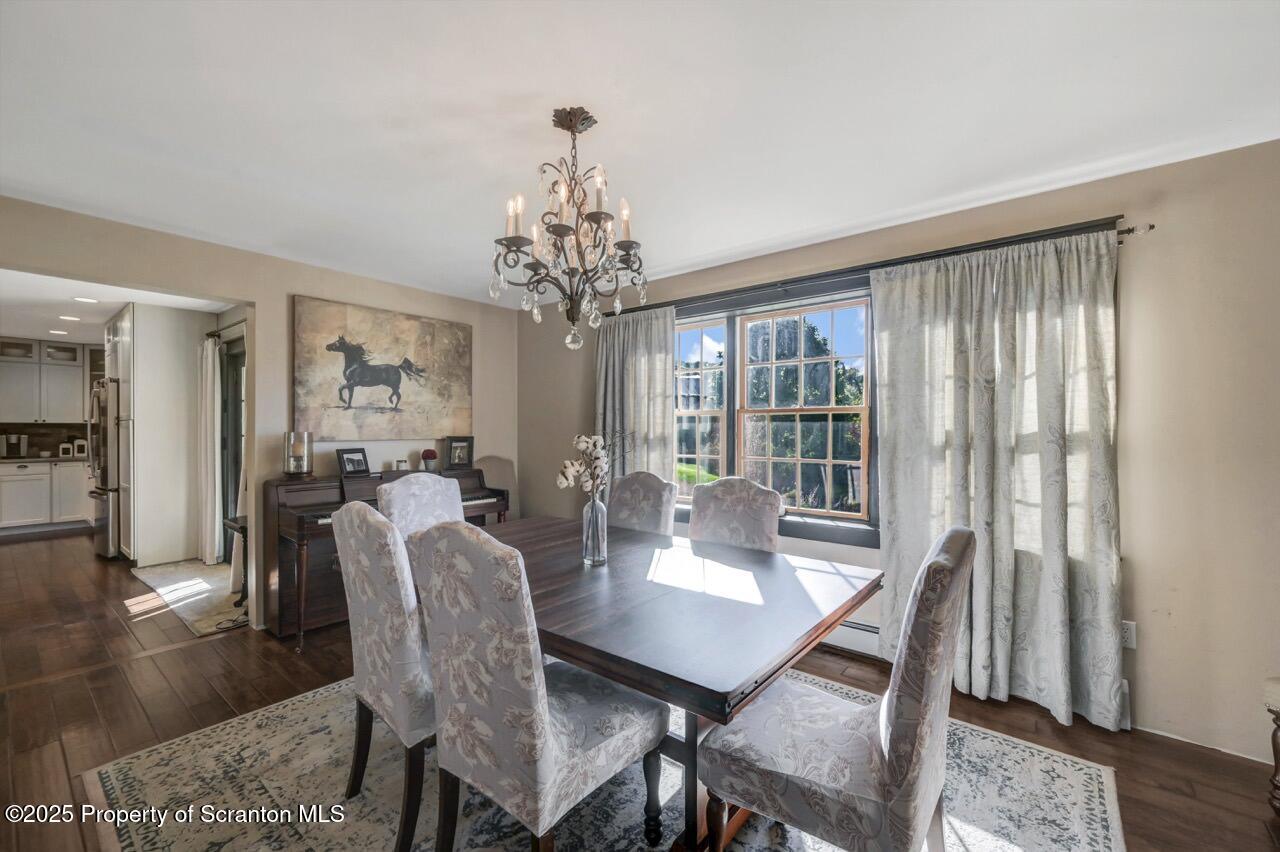 2225 Cherry Hill Road Clarks Summit, PA 18411 - Photo 24 of 81 a view of a dining room with furniture window and wooden floor