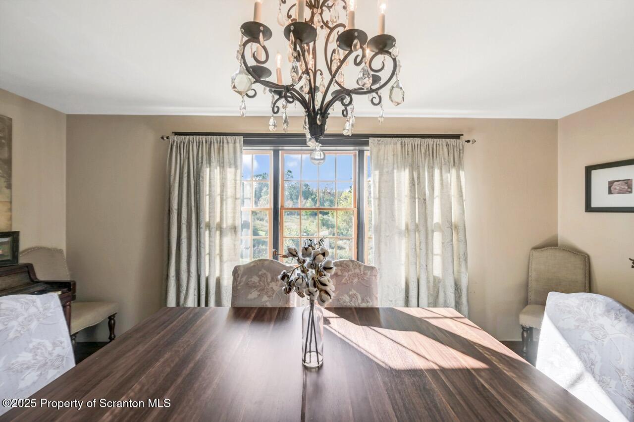 2225 Cherry Hill Road Clarks Summit, PA 18411 - Photo 25 of 81 a living room with furniture and a large window