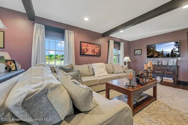 a room with furniture and a window