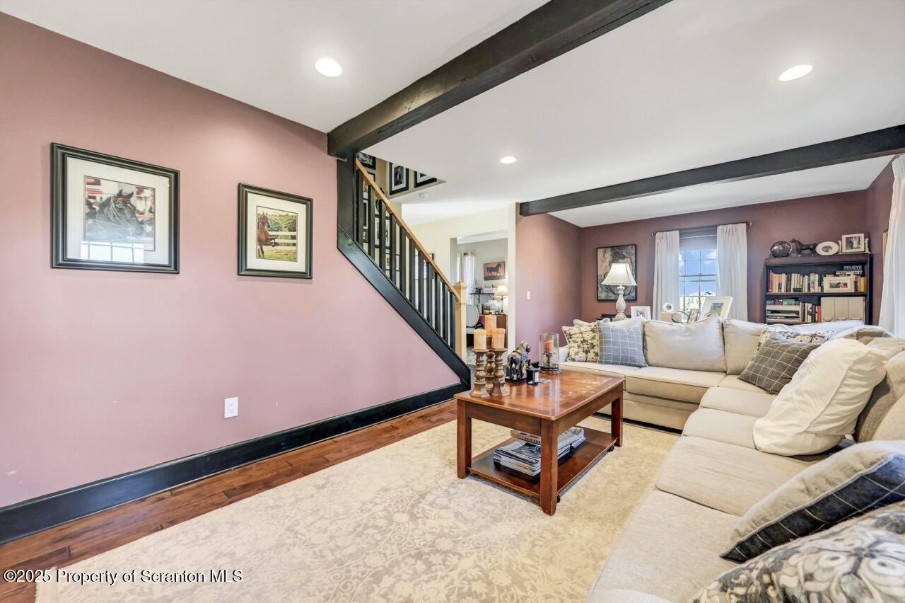 2225 Cherry Hill Road Clarks Summit, PA 18411 - Photo 31 of 81 a living room with furniture and a wooden floor